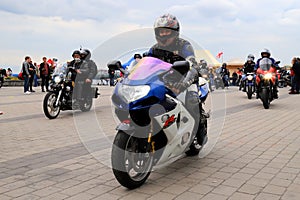 Motorcyclists on Cool Motorbikes, in helmets and leather jackets, open the motorcycle season, Motorcycling in Motorcycle Racing