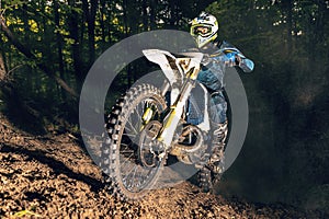 Motorcyclists trains in the forest