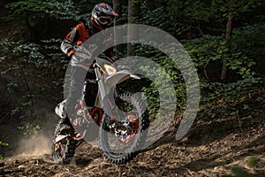 Motorcyclists trains in the forest