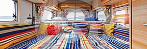Motorhome bedroom interior showcases an array of sleeping spaces in a camper van