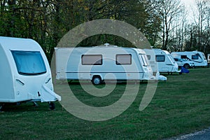 Motorhome campers parked in a  camp in early spring