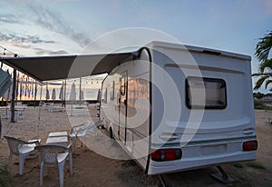 Motorhome camping by the sea in the morning