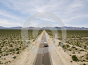 Motorhome driving on a highway in the desert of USA California
