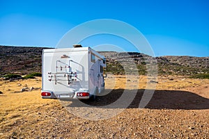 Motorhome parked on an amazing Tendopoula beach, Crete, Greece