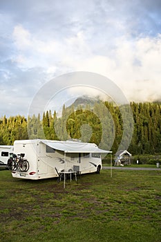 Motorhome at a campsite in the mountains