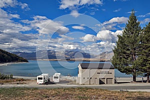 Motorhome parking by lakeside at Lake Tekapo, South Island of New Zealand