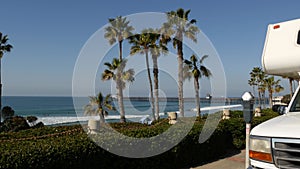 Motorhome trailer or caravan for road trip. Ocean beach, California USA. Camper van, RV motor home.