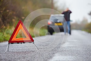 Motorist Broken Down On Country Road Phoning For Help