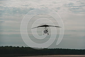 The motorized hang glider ready to landing