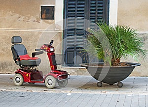 Motorized wheelchair car.