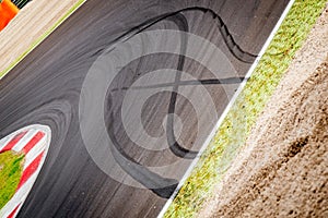 Motorsport racing track and car slammed brakes sign