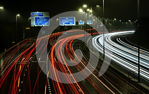 Motorway fast traffic light trails at night