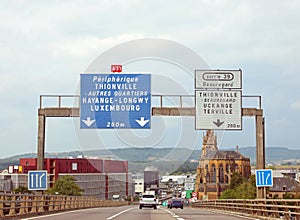 motorway sign with directions to reach Luxembourg or other French locations towards the border