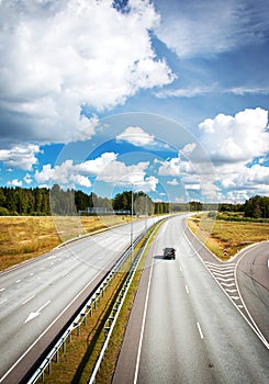 Motorway in summer with beautiful clouds