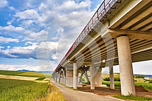 Motorway viaduct bridge, Spis region, Slovakia. Autostrada highway in Europe. D1 magistal near SpiÅ¡skÃ½ hrad, arched bridge.