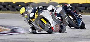 Mototbikes Racing on Track