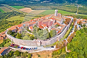 Motovun. Aerial view of idyllic hill town of Motovun surrounded by defense stone walls and Mirna river valley