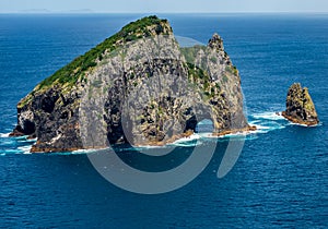Motu KÅkako, also known as Piercy Island or The Hole In The Rock.