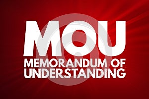 MOU - Memorandum Of Understanding acronym, business concept background photo