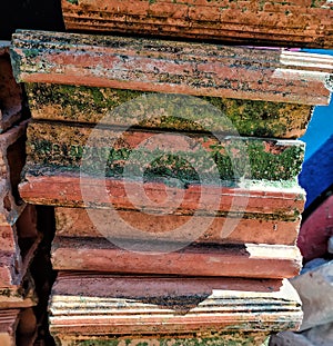 Moudy and old brick blocks in poor conditions. photo