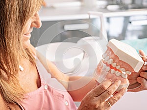 Mould of human teeth. Oral health concept. Mould of human teeth. Close up dental gypsum model. Plaster cast human jaws prothetic