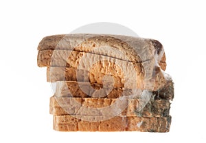 Mouldy bread isolated on white background.