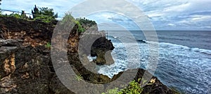 mounds of rock towering on the edge of the open sea 2