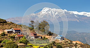 Mount Annapurna and nepalese villege