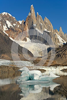 Mount Cerro Torre from lake Torre photo