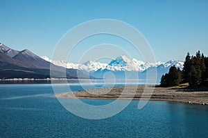 Mount Cook set against the blue waters of Lake Taupo, New Zealand