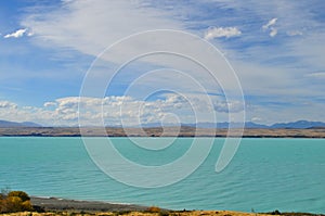 Mount Cook viewpoint with the lake Pukaki and road leading to mount cook village