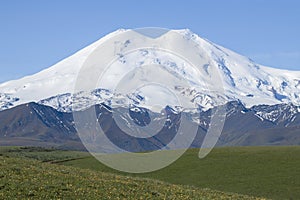 Mount Elbrus on a sunny June morning. Kabardino-Balkaria photo