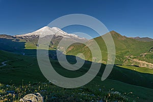 Mount Elbrus at sunrise Caucasus mountains photo