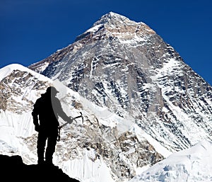 Mount Everest from Kala Patthar and silhouette of man