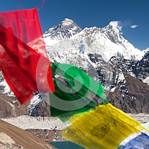 Mount Everest and Lhotse with buddhist prayer flags