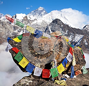 Mount Everest and Lhotse with buddhist prayer flags