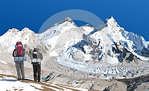 mount Everest Lhotse and Nuptse with two hikers