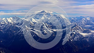 Mount Everest the world`s tallest mountain, rising above the other Himalayan mountains, Nepal