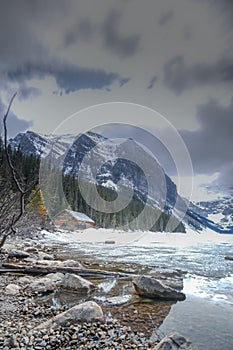 Mount fairview, partly frozen lake, Lake Louise Banff National Park, Alberta Canada