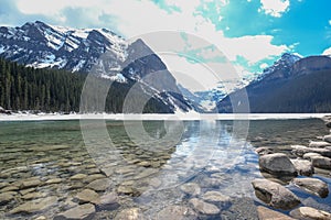 Mount fairview, partly frozen lake, Lake Louise Banff National Park, Alberta Canada