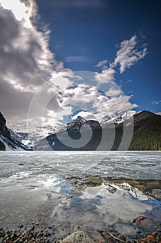 Mount fairview, partly frozen lake, Lake Louise Banff National Park, Alberta Canada