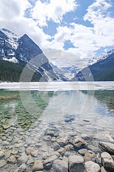 Mount fairview, partly frozen lake, Lake Louise Banff National Park, Alberta Canada