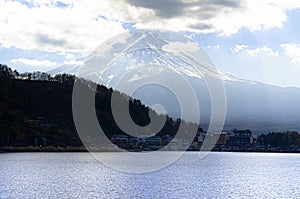 Mount Fuji behind Lake Kawaguchiko and clouds in winter - Japan