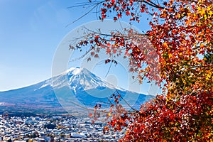 Mount Fuji framed with red maple leaves beautifully in autumn