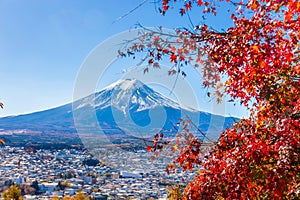 Mount Fuji framed with red maple leaves beautifully in autumn