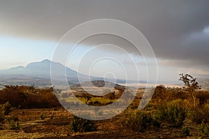 Mount Hanang and Balangida Lake, Manyara Region, Tanzania, at heavy sky dawn