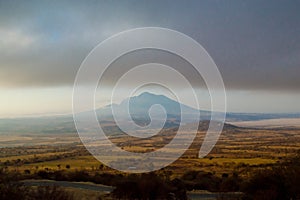 Mount Hanang and Balangida Valley, Tanzania, at heavy sky dawn