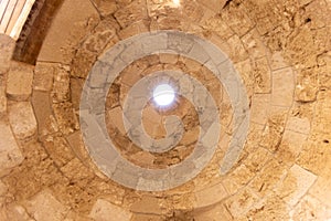 Mount Herodion and the ruins of the fortress of King Herod inside an artificial crater. The Judaean Desert, West Bank.