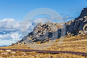 Mount Kosciuszko summit walk and beautiful rocks on bright sunny