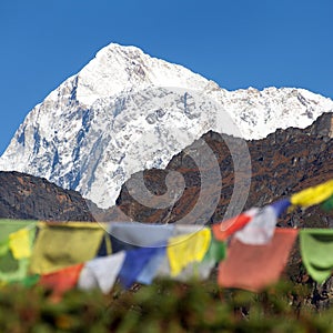 Mount Makalu with buddhist prayer flags, Nepal